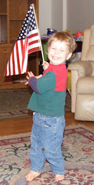 Lil' Bro Holding Flag