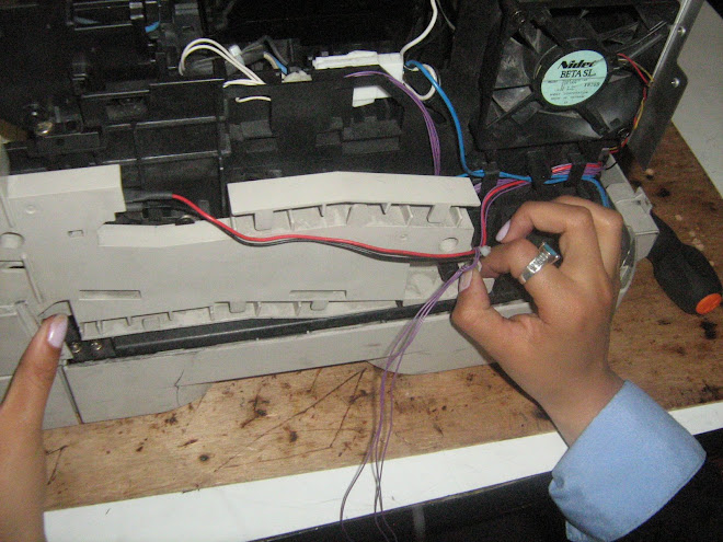 inpresora, ventilador y ramas de conectores