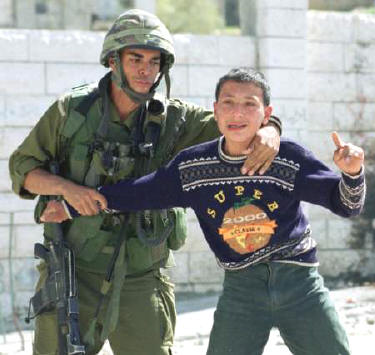 [Palestinian+Boy+w+Soldier.jpg]