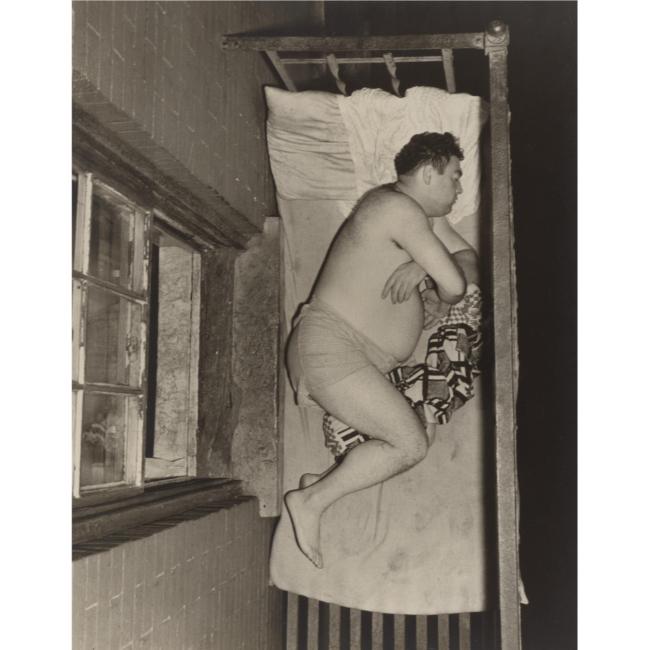 [Weegee+-+man+sleeping+on+a+fire+escape,+1943.jpg]
