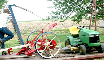 Answer: the one on the left, a McCormick.  The one on the right is a John Deere