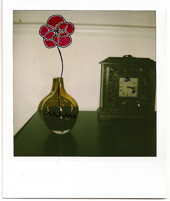 [polaroids_flowerclock.jpg]