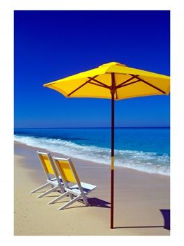 [Yellow-Chairs-and-Umbrella-on-Pristine-Beach-Caribbean.jpg]