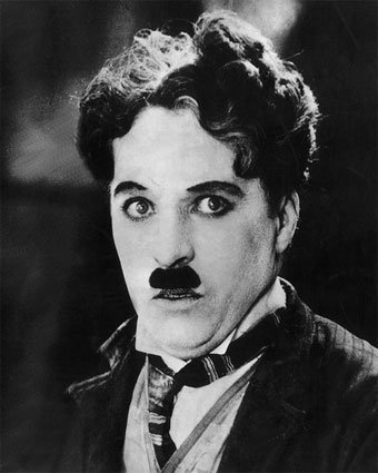 [Charlie-Chaplin-Photograph-C1203700.jpg]