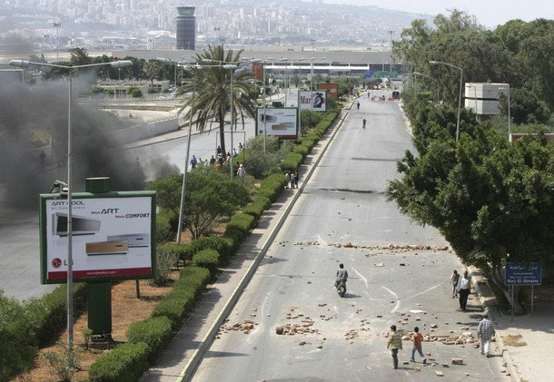 [Hezbollah+supporters+burn+tyres+at+the+entrance+of+Beirut's+International+airport+in+Beirut+May+8,+2008.jpg]