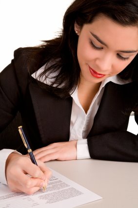 [woman+signing+document.jpg]