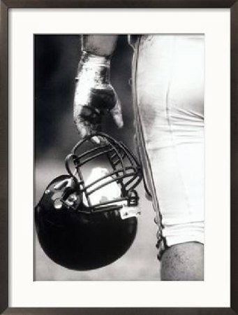 [Low-Angle-View-of-an-American-Football-Player-Holding-a-Helmet-Framed-Photographic-Print-C12404815.jpg]