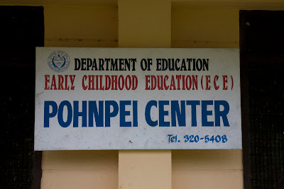 Sign saying Department of Education, Early Childhood Education (ECE), POHNPEI CENTER, tel. 320-5408