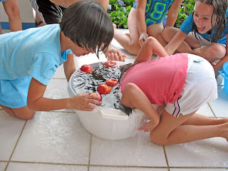 Erica Ridley in Costa Rica: bobbing for apples