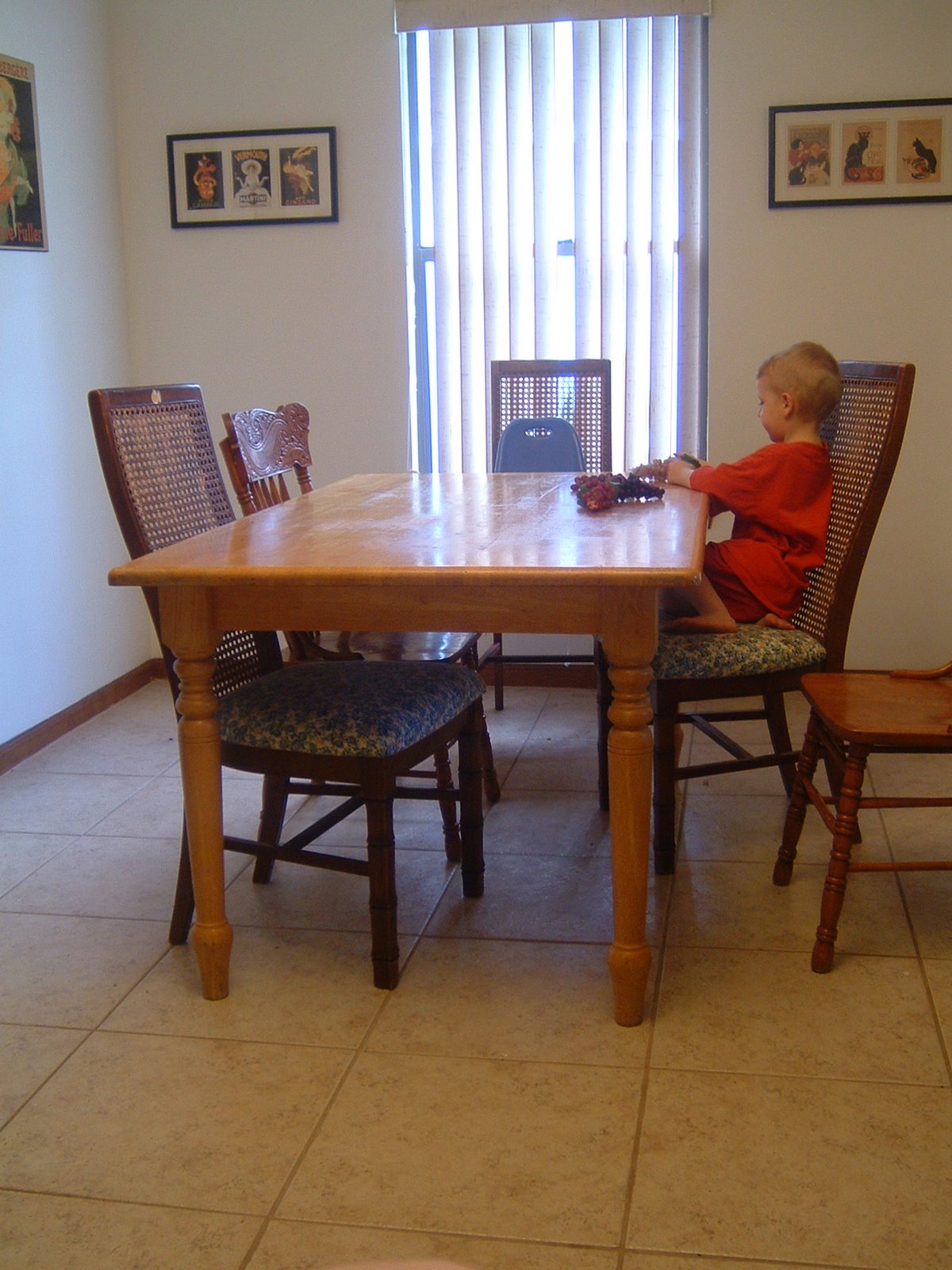 [dining+room+table,+with+grapes+and+child+001.jpg]