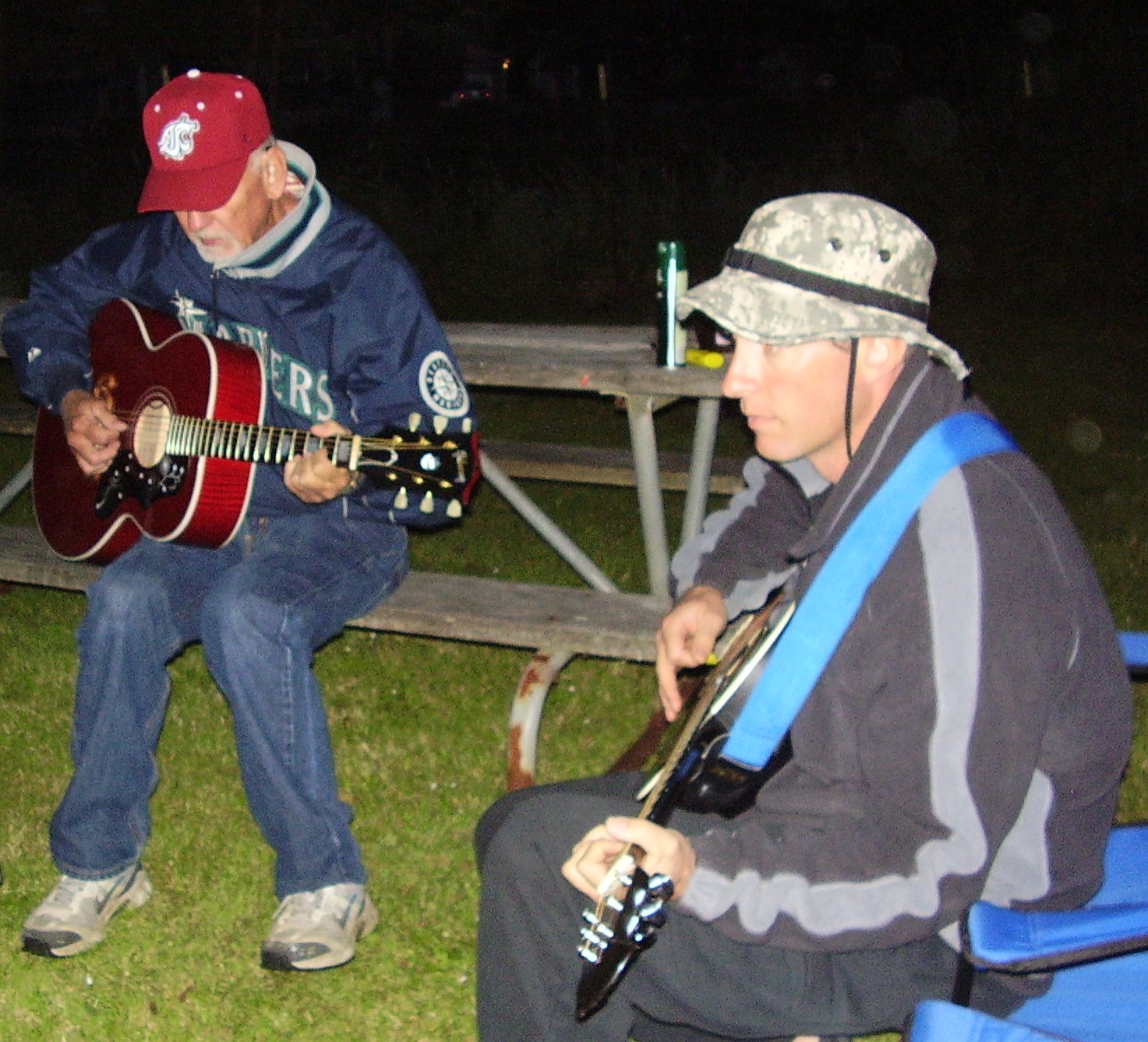 [Chris+and+Tory+Christensen+campfire+singing.jpg]