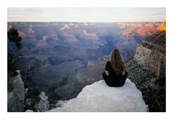 [A-woman-looks-out-over-the-spectacular-canyon-scenery-Posters.jpg]
