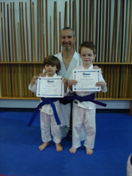 Justin is officially a Purple Belt!