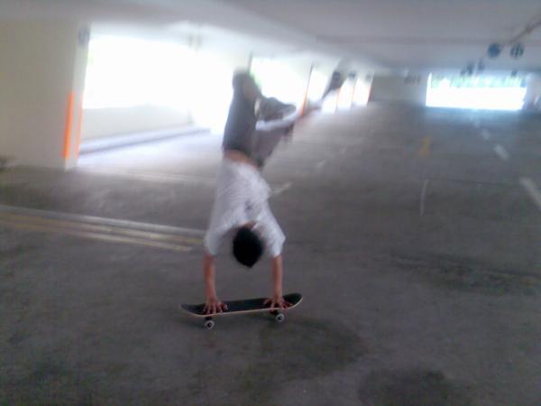 [handstand+on+skateboard.jpg]