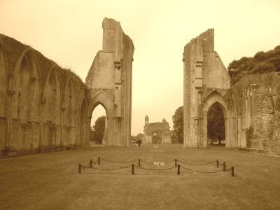 Glastonbury Abbey was ruined by fire in 1184, rebuilt, and reduced to a shell in the Dissolution of the 1530s.