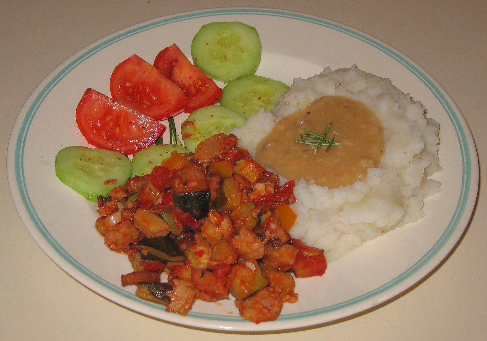 [20070604+Leftover+Zucchini-Seitan+with+Mashed+Potatoes+and+Shiitake+Mushroom+Gravy.jpg]