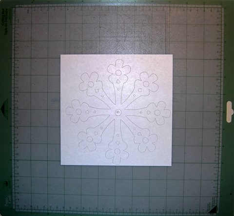 [cut+snowflake+on+mat+paper+centered.jpg]