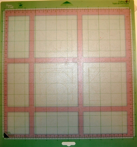 [grid+behind+mat+on+white+table.jpg]