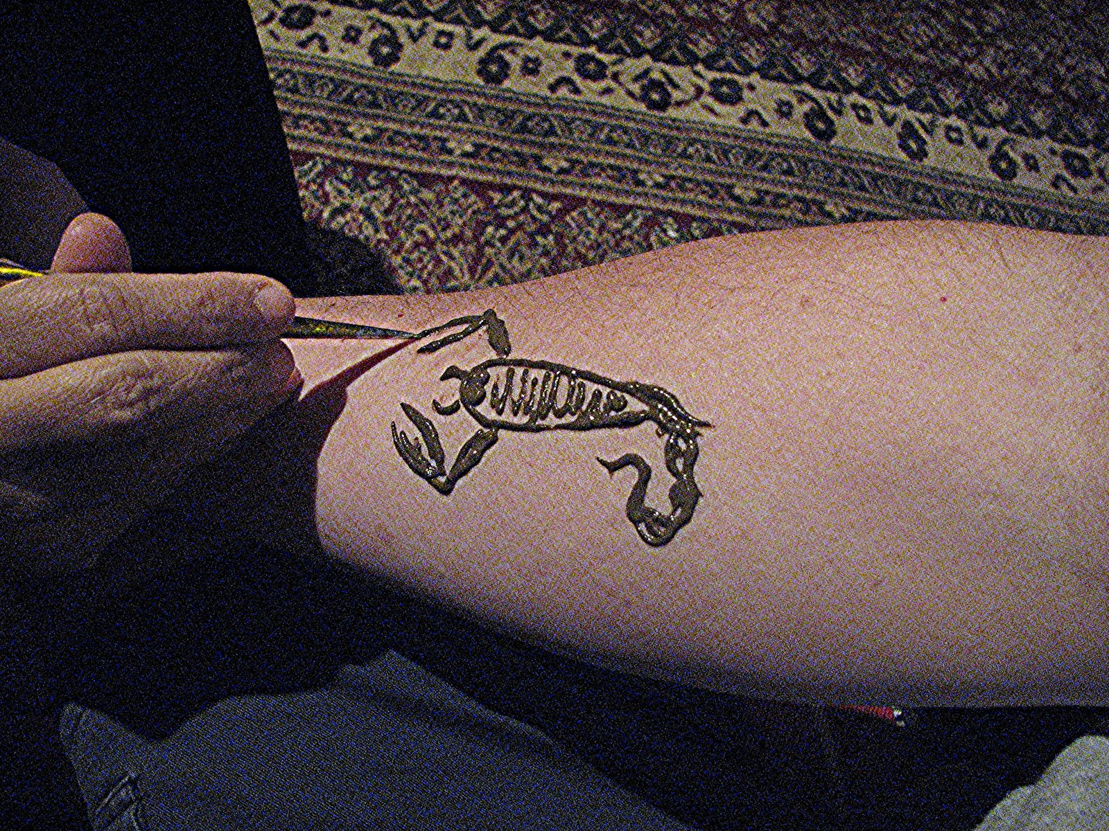 [scorpion+tattoo.jpg]