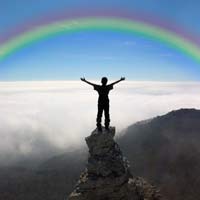 [Rainbow+and+person+on+pinnacle.jpg]