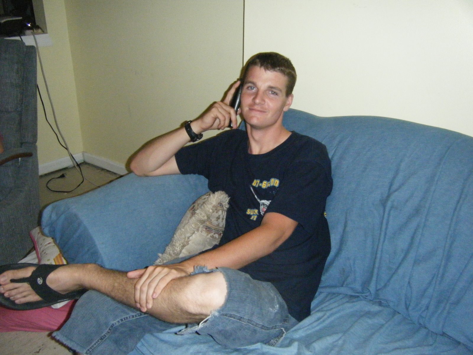 Jon sitting on the couch while at a stopover on his way to Japan.  Click on this picture to see a bigger version.