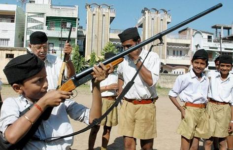 Indian Muslim Blog: News And Views about Indian Muslims: Boy holds gun at RSS function: What he is aiming at?