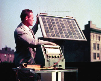 Bell Labs engineer testing solar battery