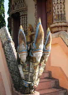 3 headed snake (Naga or Naka) at the entrance to the temple