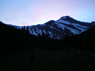 The sun setting behind Mount Richarson