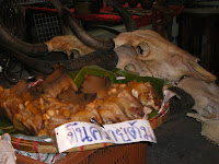 animal hoofs for sale at a market in Thailand; eating in asia is an adventure!