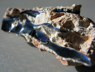 A piece of raw opal, found at Lightning Ridge Australia